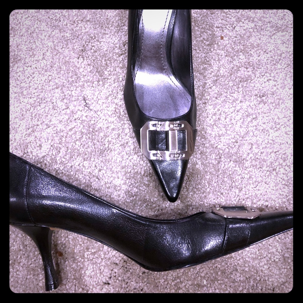 Black heel with silver buckle